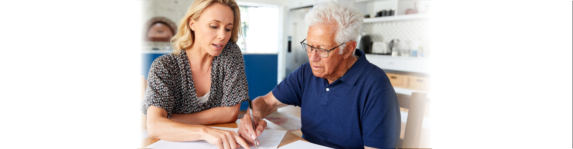 woman assisting the elderly man