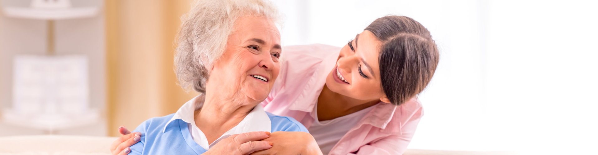 senior women at home sitting on the couch